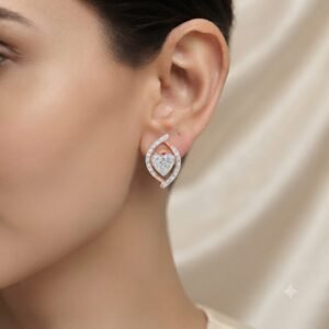 Vibrant Emerald Cut Green Emerald Gold Stud Earrings | Hussain Gems