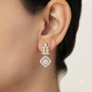 Vibrant Emerald Cut Green Emerald Gold Stud Earrings | Hussain Gems